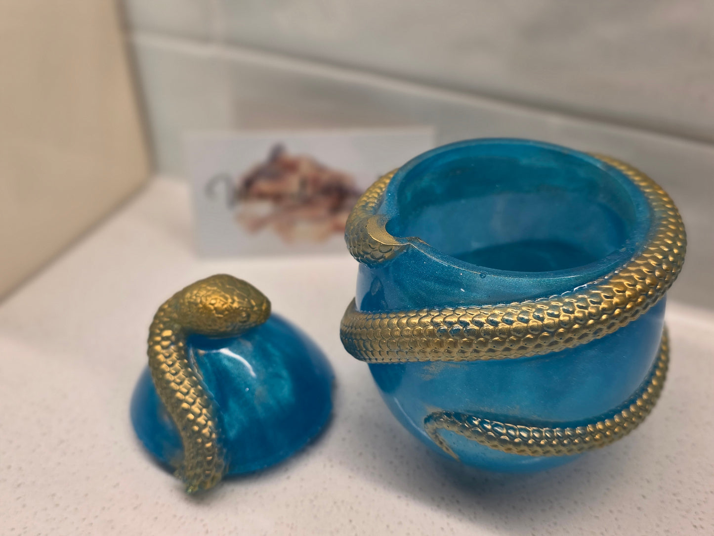 Snake protecting an Egg